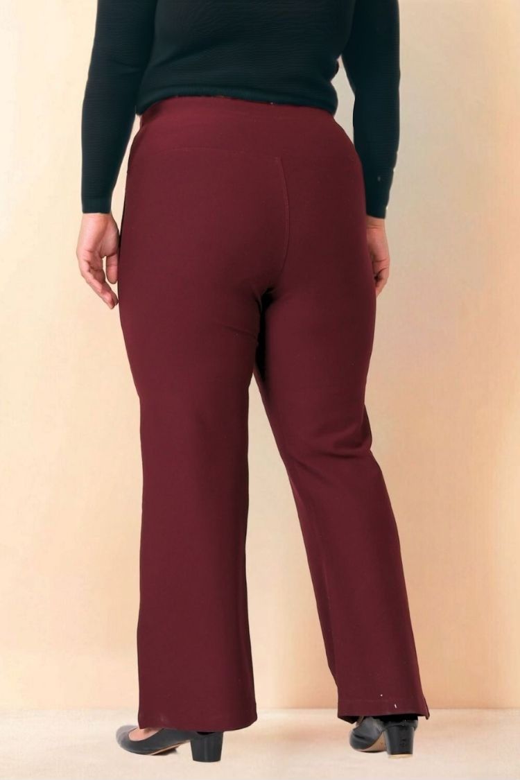 Detail view the burgundy pants are a must for any woman.