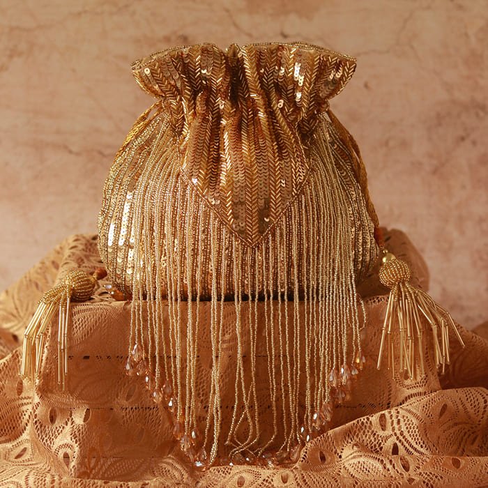Twinkle Heavy Tassles Potli Bag | Elegant Silk Accessory for Special Occasions - Twinkle_Golden