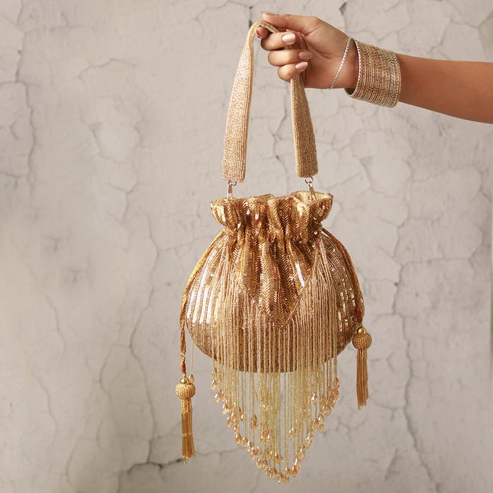 Twinkle Heavy Tassles Potli Bag | Elegant Silk Accessory for Special Occasions - Twinkle_Golden