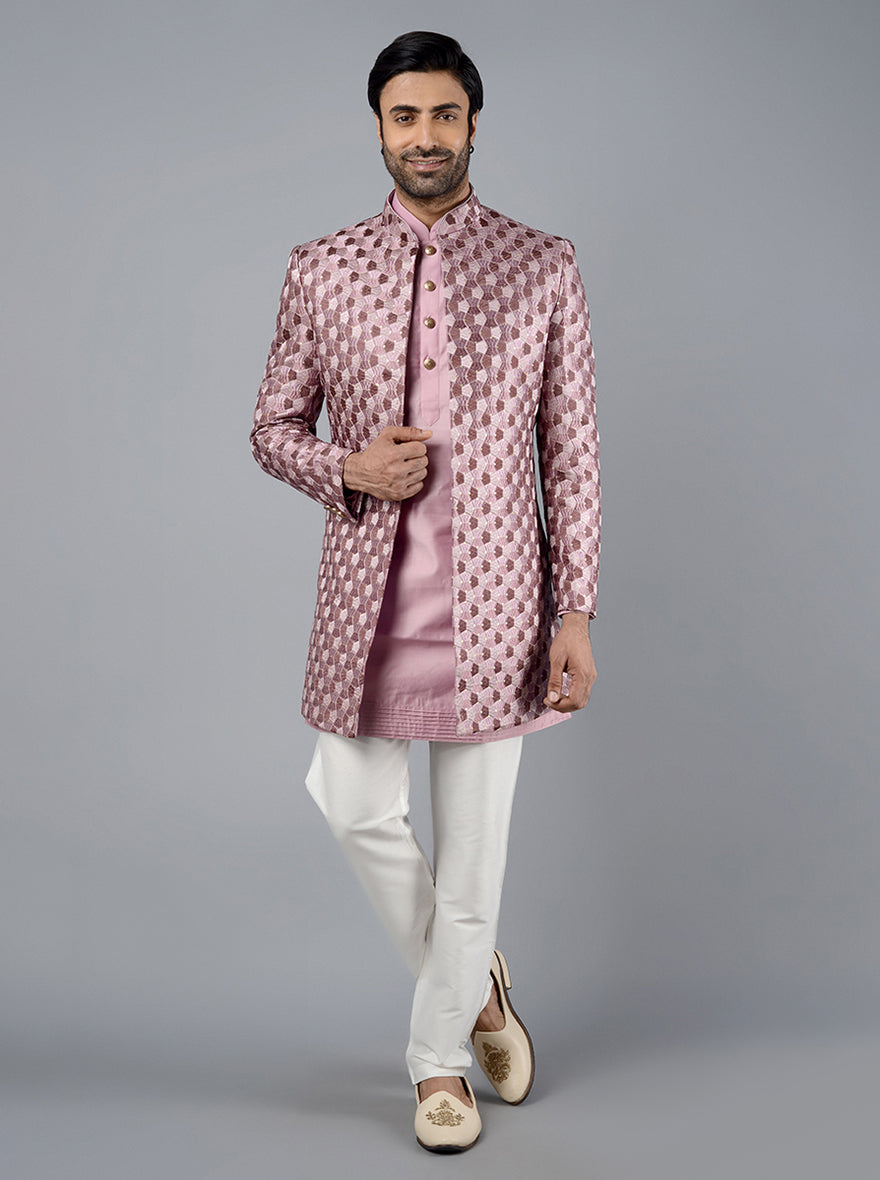 Elegant silk blend jodhpuri suit with geometric embroidery for royal occasions.
