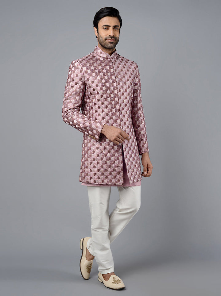 Silk blend jodhpuri suit with resham work and traditional look for weddings.