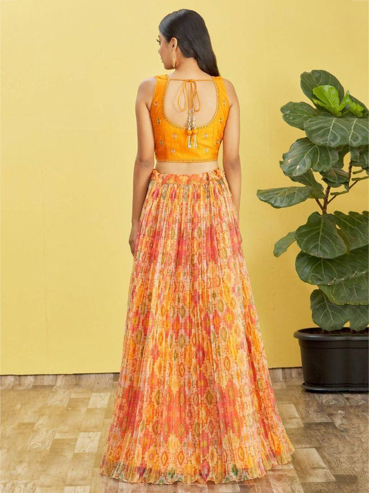 An Orange Organza Lehenga Choli with Mirror Work | Perfect for Haldi & Engagements