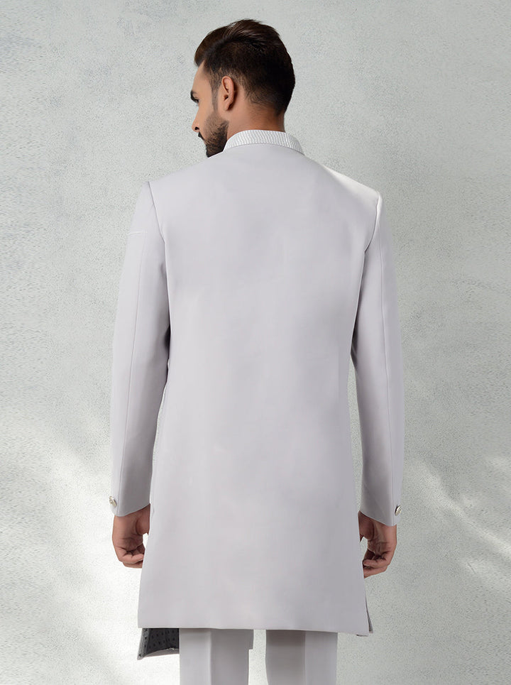 Designer grey Indo-Western dress for men with layered style, full sleeves, and matching pants.